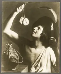 Honthorst Gerrit van (Gherardo delle Notti) - sec. XVII - Giovane uomo con in mano una candela accesa che solleva un formaggio e un fiasco posato di lato